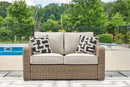 Beachcroft Outdoor Loveseat with Cushion - Furniture Now (CA)